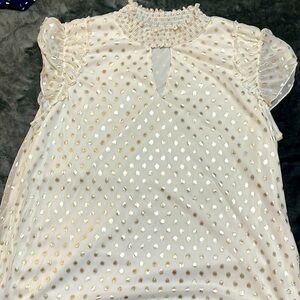 Cream color blouse with gold dots